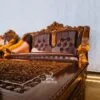 Kursi tamu Ganesa dari kayu jati Jepara dengan ukiran mewah dan finishing mengkilap